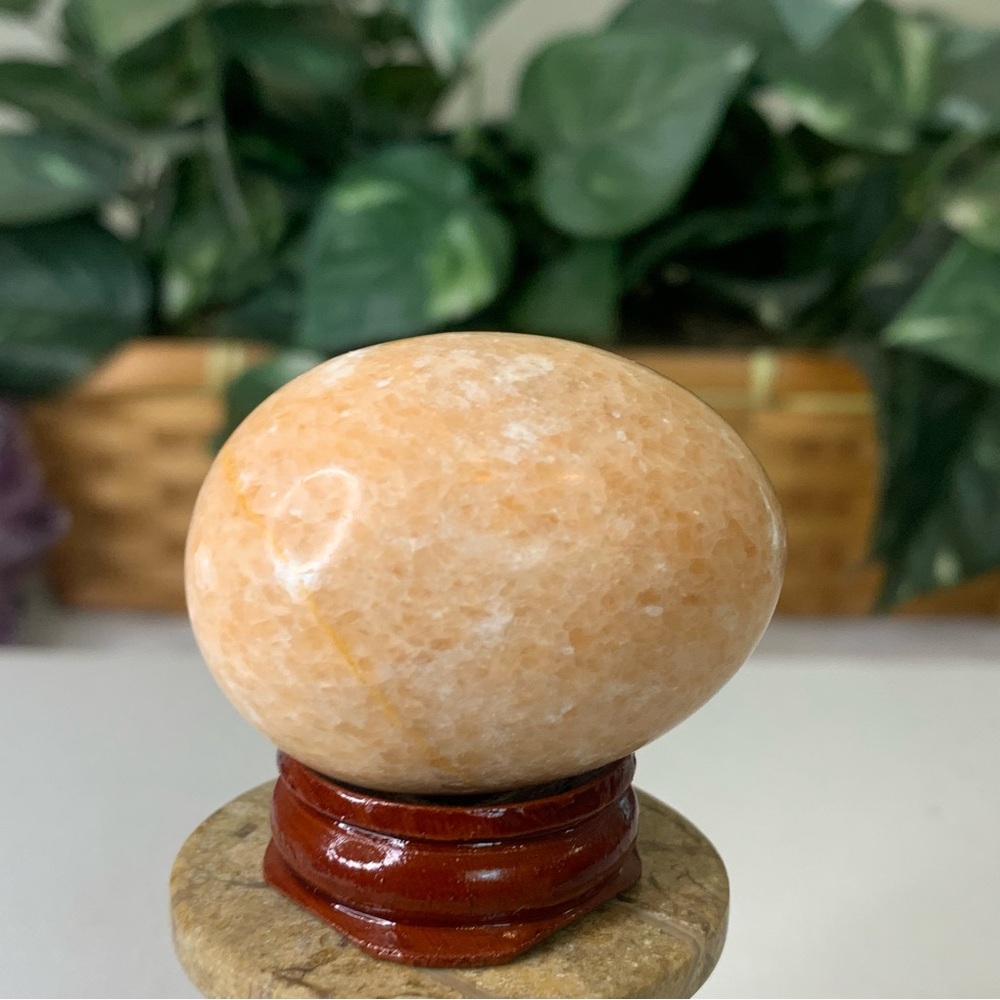 Natural Orange Calcite Egg Polished Crystal Meditation Stone with Wood Stand 2" - Picture 7 of 12